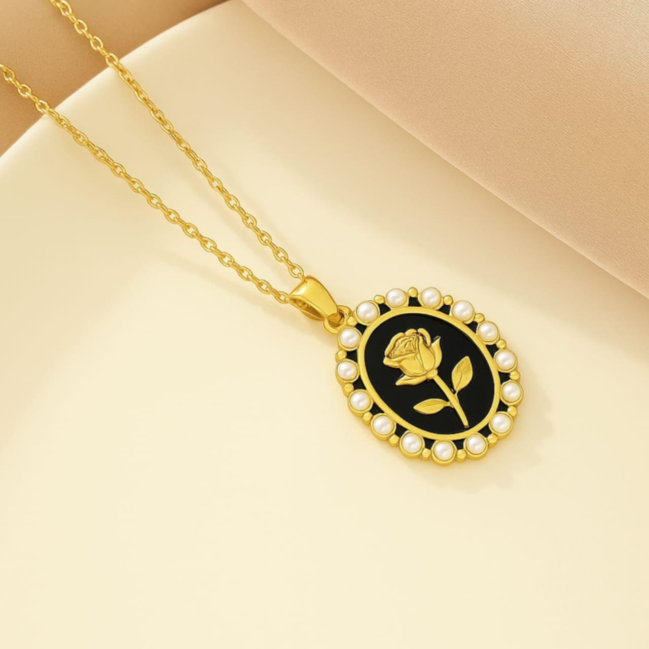 Midnight Bloom Necklace: Black Resin Base with Golden Flower